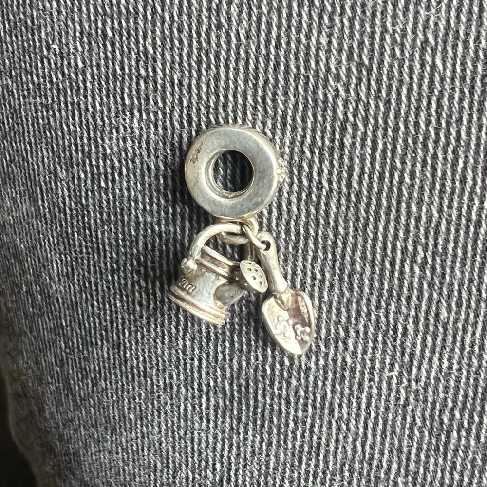 Pandora watering can and shovel charm
